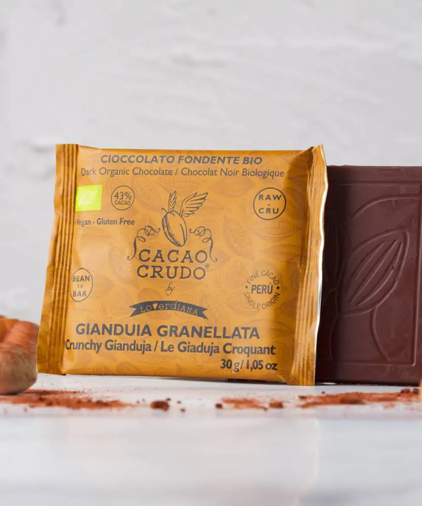 Foto Cioccolato fondente gianduia granellata - RAW BIO 